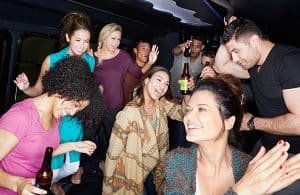 group of friends on a party bus